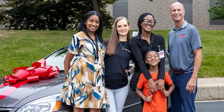 Carroll Community College family who received vehicle through the College’s ongoing partnership with Vehicles for Change.
