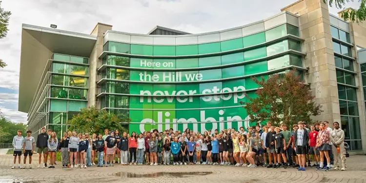 Group photo of over 100 students from the Carroll County Scholars 9th Grade Kickoff event at McDaniel College.