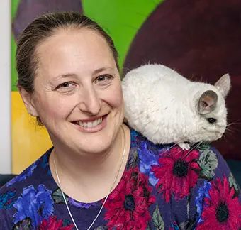 Liivi Sharp with her 21-year-old white chinchilla, Siku.