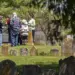 The Sullivan family meets at the Jerusalem Lutheran Church cemetery after researching their family roots.