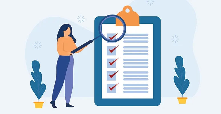 Person standing beside a large clipboard with a checklist and a magnifying glass zooming in on items to review the list for accuracy.